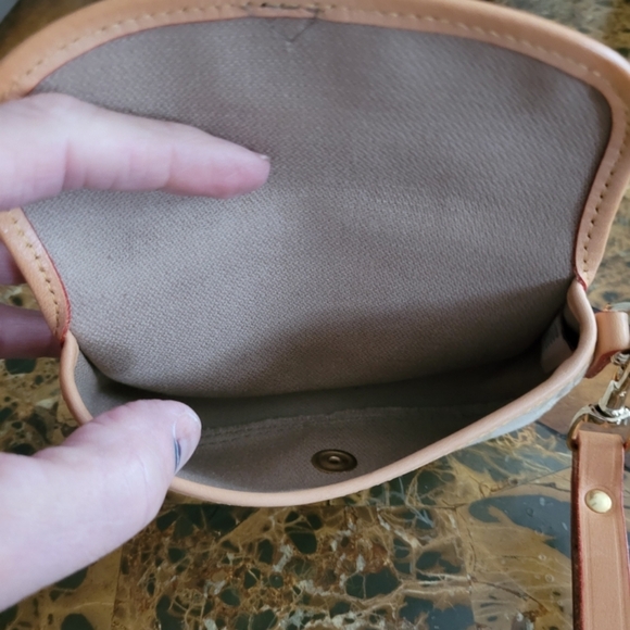 Dooney and Bourke Elegant Cream and Tan Women's pouch - Picture 4 of 4